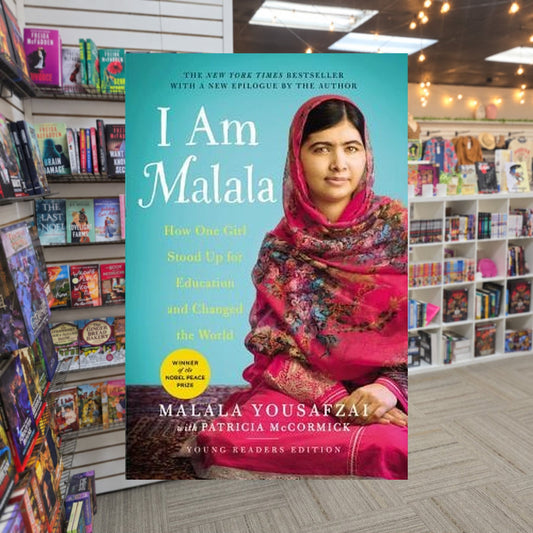 I Am Malala: How One Girl Stood Up for Education and Changed the World by Malala Yousafzai, Patricia McCormick (Primary Contributor) — actual cover on The Perk bookstore background
