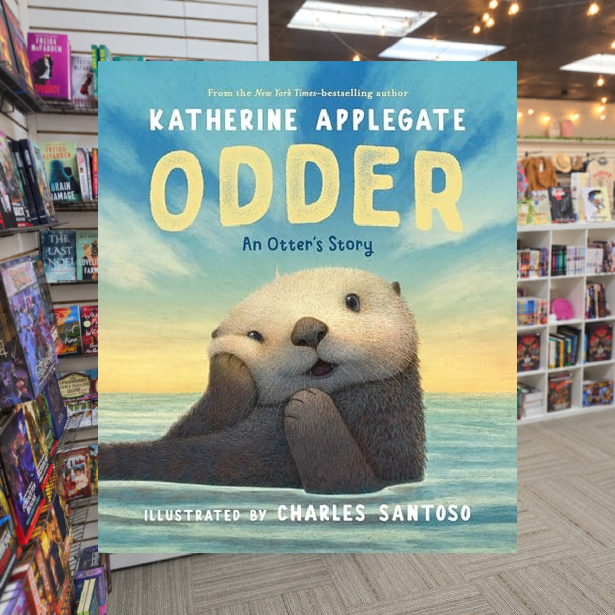 Odder: An Otter's Story by Katherine Applegate — actual cover on The Perk bookstore background
