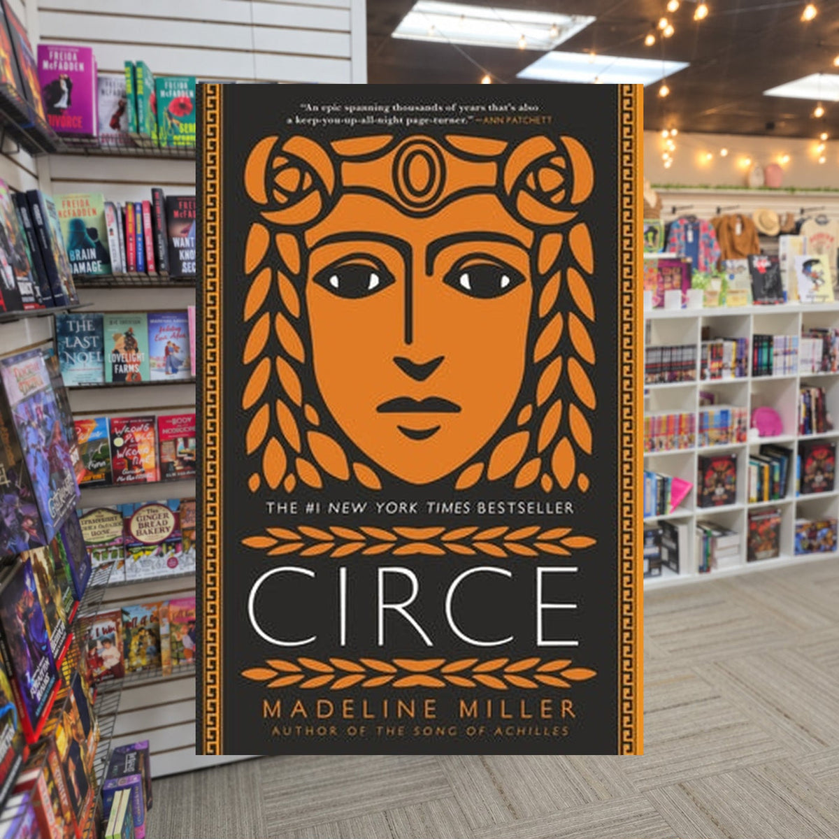 Circe by Madeline Miller — actual cover on The Perk bookstore background