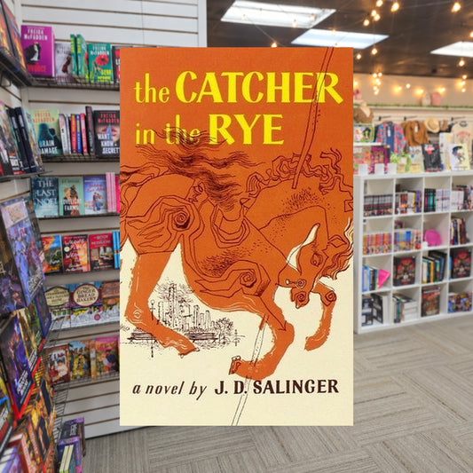 The Catcher in the Rye by J.D. Salinger — actual cover on The Perk bookstore background