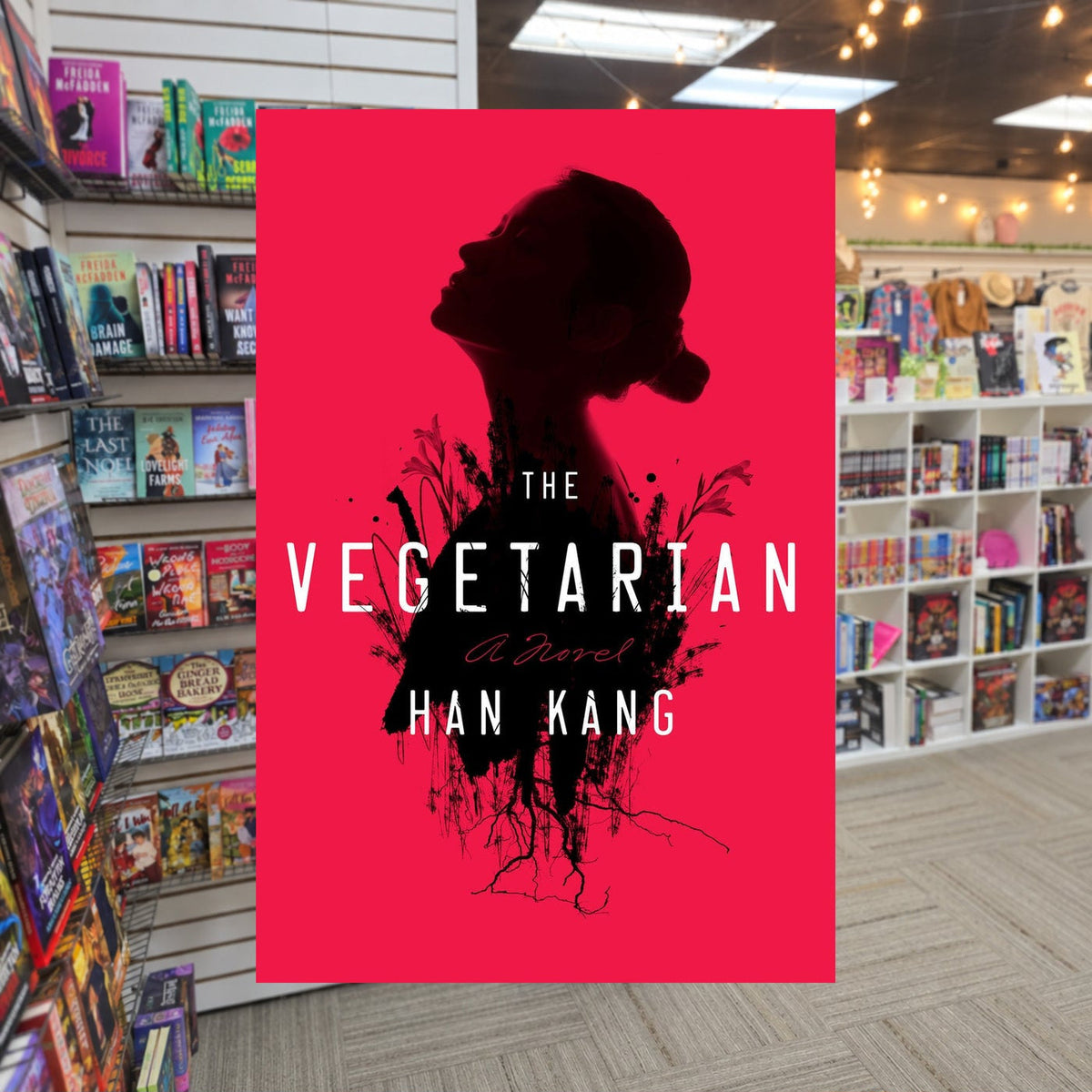 The Vegetarian by Han Kang — actual cover on The Perk bookstore background