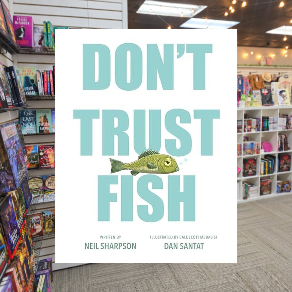 Don't Trust Fish by Neil Sharpson — actual cover on The Perk bookstore background