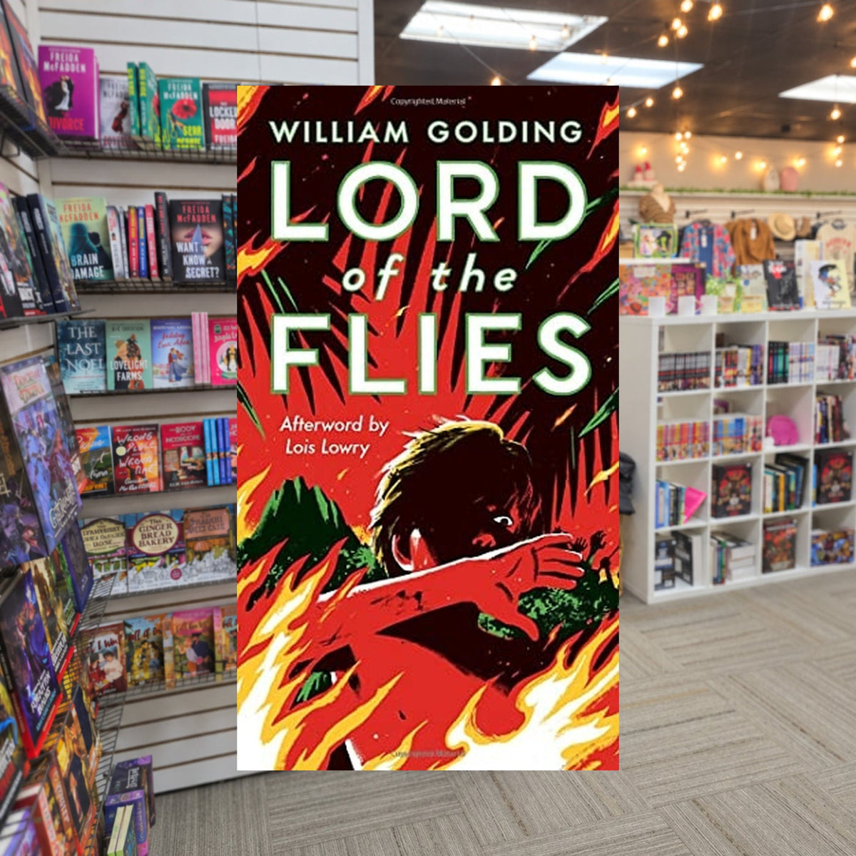 Lord of the Flies by William Golding, Lois Lowry (Afterword) — actual cover on The Perk bookstore background