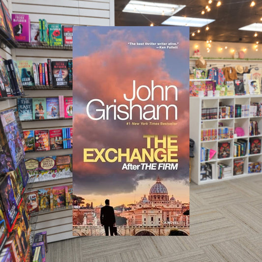 The Exchange: After the Firm by John Grisham — actual cover on The Perk bookstore background