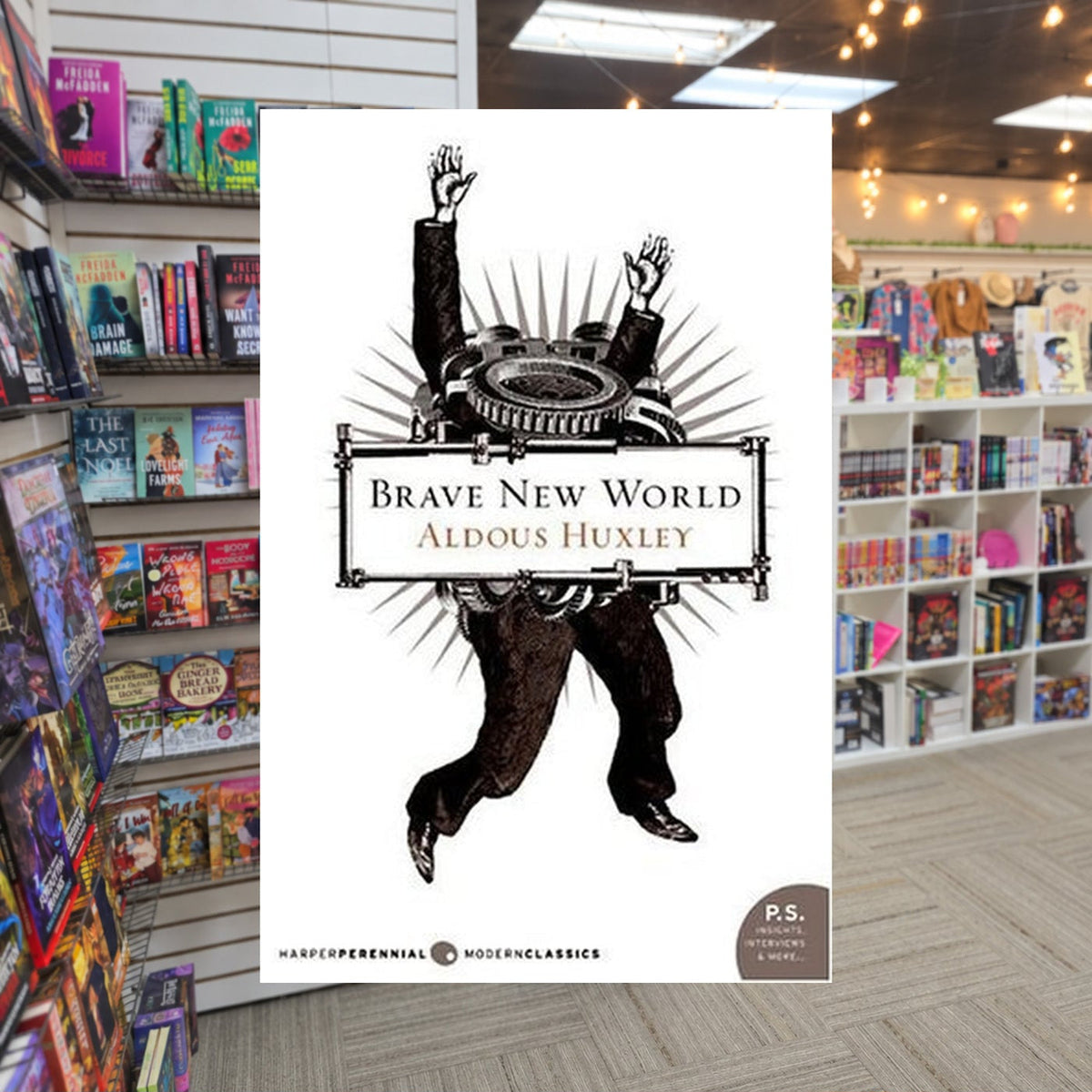 Brave New World #1: Brave New World by Aldous Huxley — actual cover on The Perk bookstore background