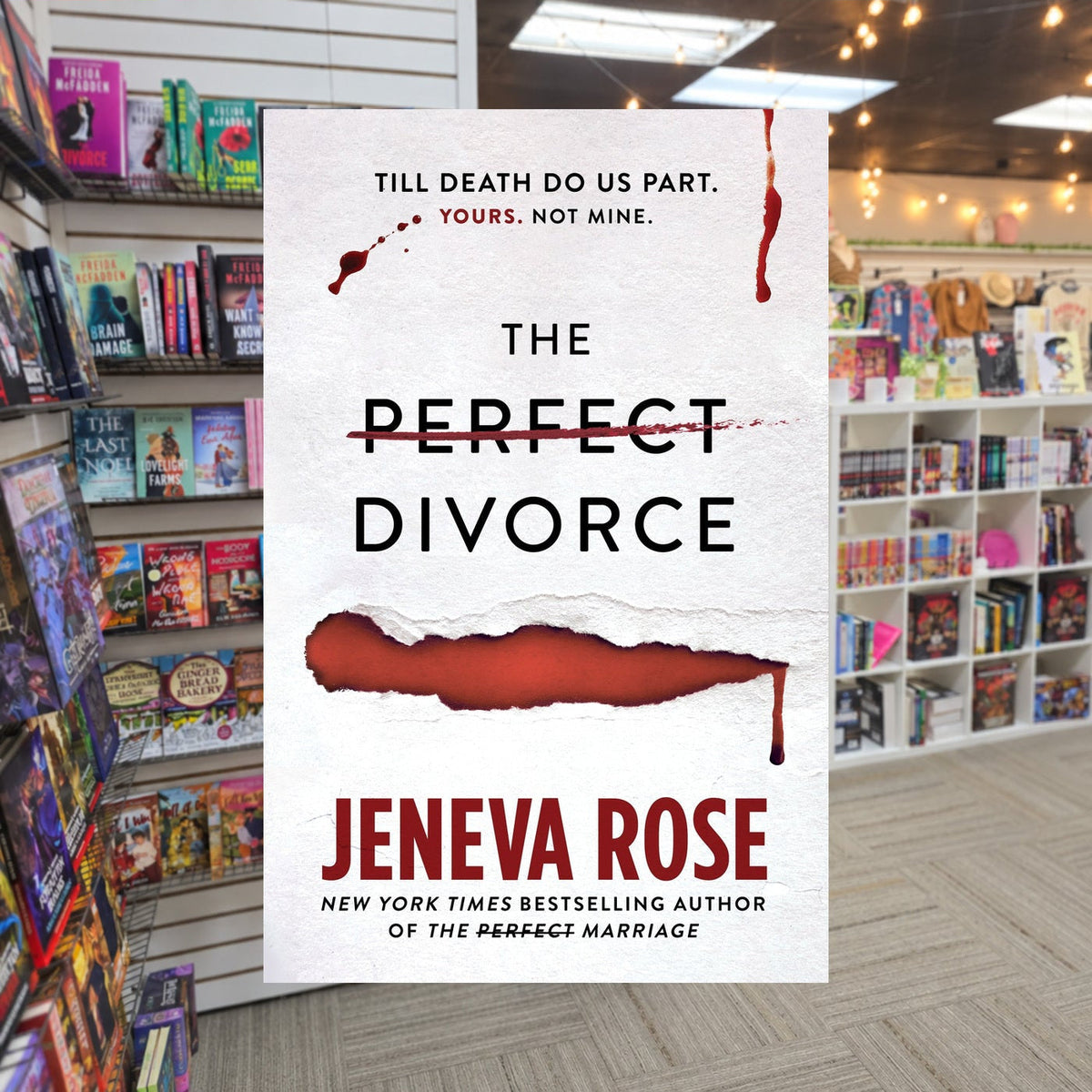 The Perfect Divorce by Jeneva Rose — actual cover on The Perk bookstore background