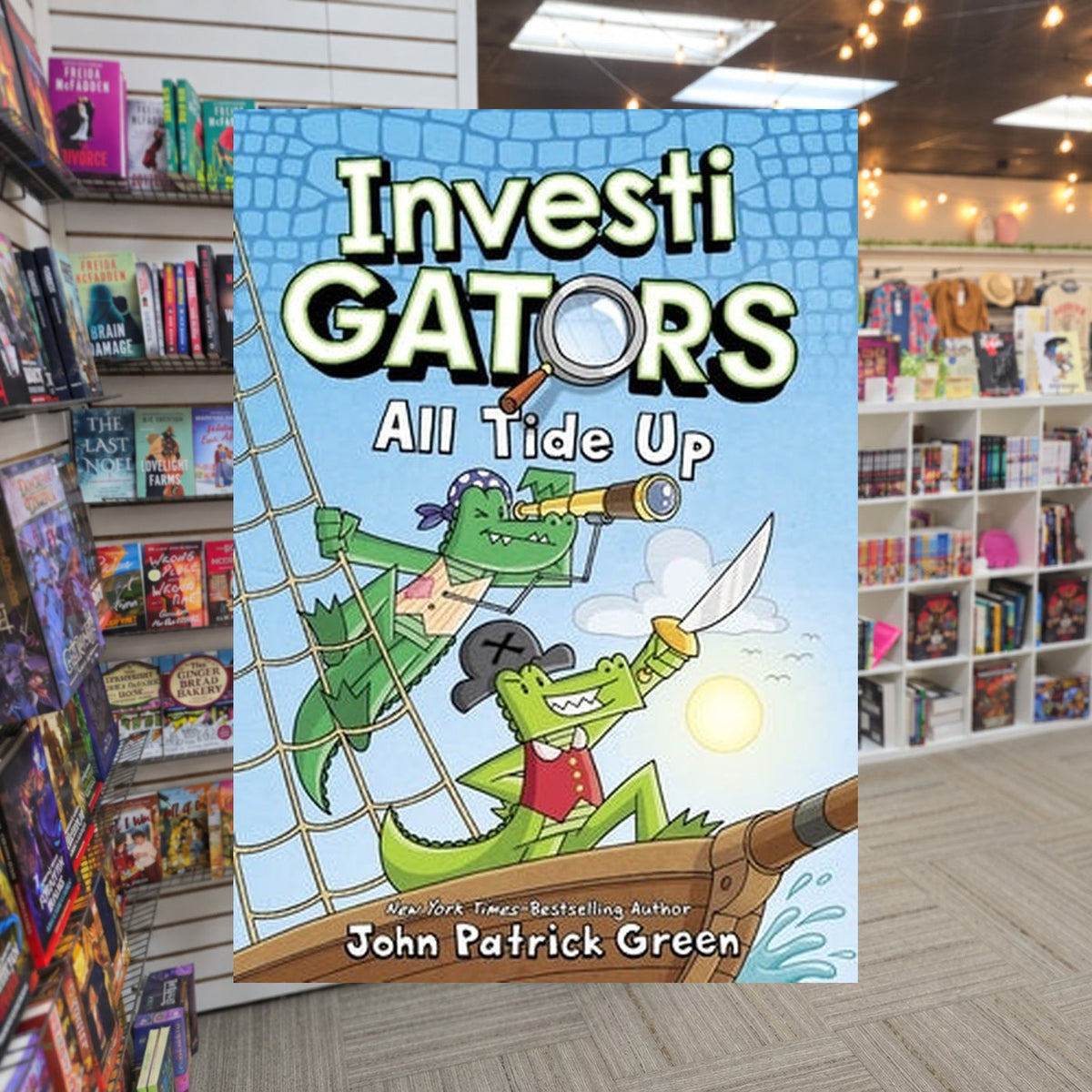 All Tide Up by John Patrick Green — actual cover on The Perk bookstore background