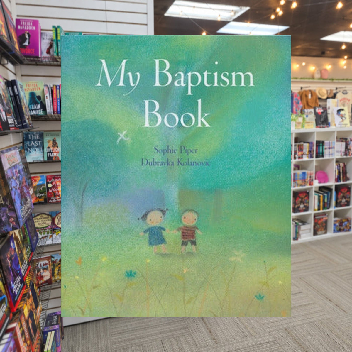 My Baptism Book by Sophie Piper — actual cover on The Perk bookstore background