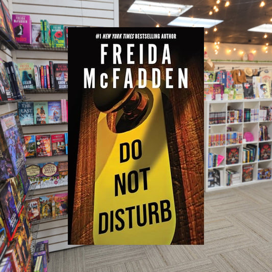 Do Not Disturb by Freida McFadden — actual cover on The Perk bookstore background