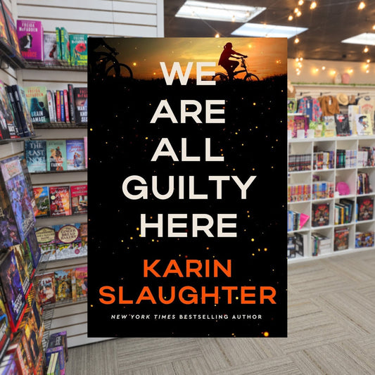 We Are All Guilty Here by Karin Slaughter — actual cover on The Perk bookstore background