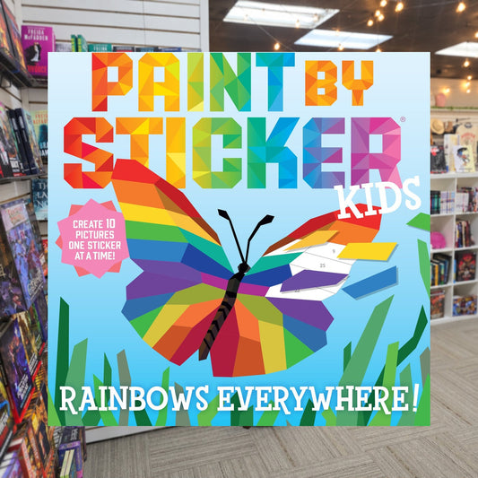 Paint by Sticker Kids: Rainbows Everywhere!: Create 10 Pictures One Sticker at a Time! by Workman Publishing — actual cover on The Perk bookstore background