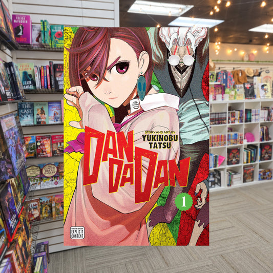 Dandadan, Vol. 1 by Yukinobu Tatsu — actual cover on The Perk bookstore background