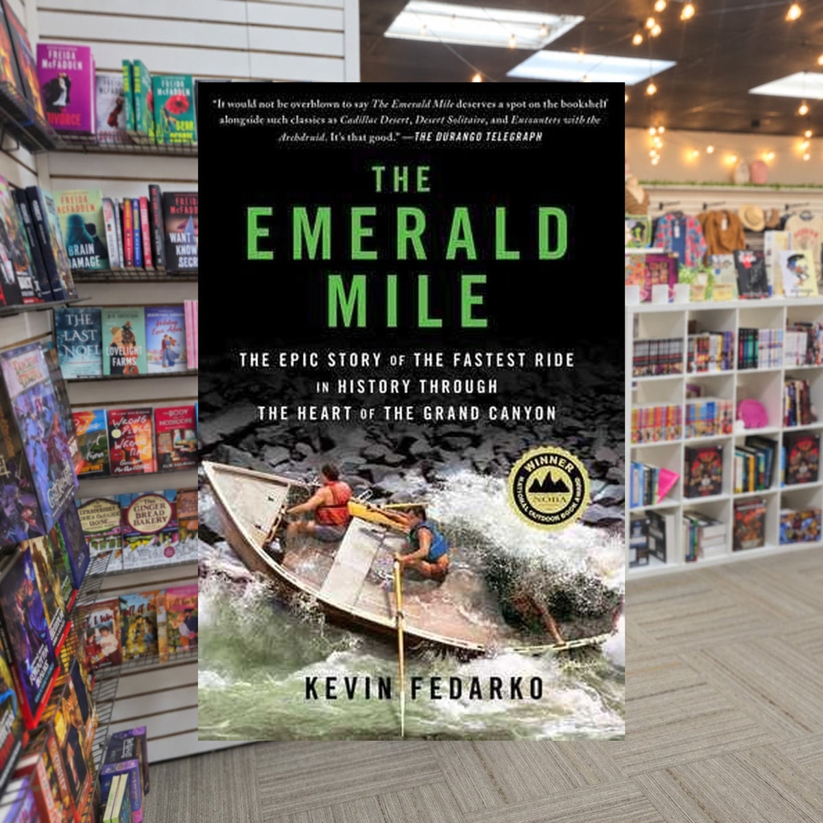 The Emerald Mile by Kevin Fedarko — actual cover on The Perk bookstore background