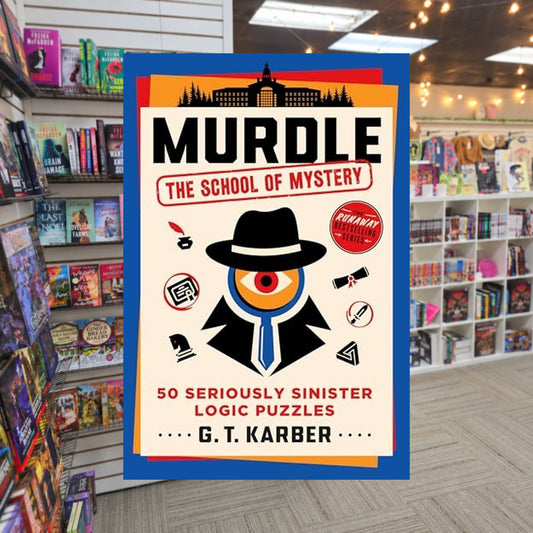 Murdle: The School of Mystery — actual cover on The Perk bookstore background
