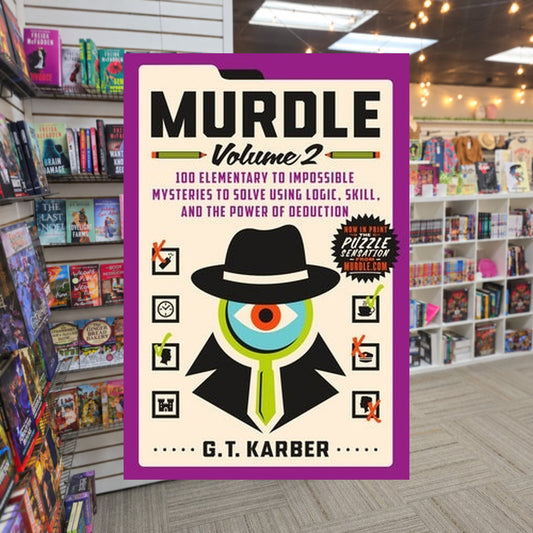 Murdle: Volume 2 — actual cover on The Perk bookstore background