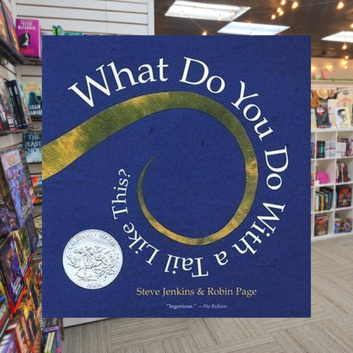 What Do You Do with a Tail Like This? by Steve Jenkins ,  Robin Page — actual cover on The Perk bookstore background