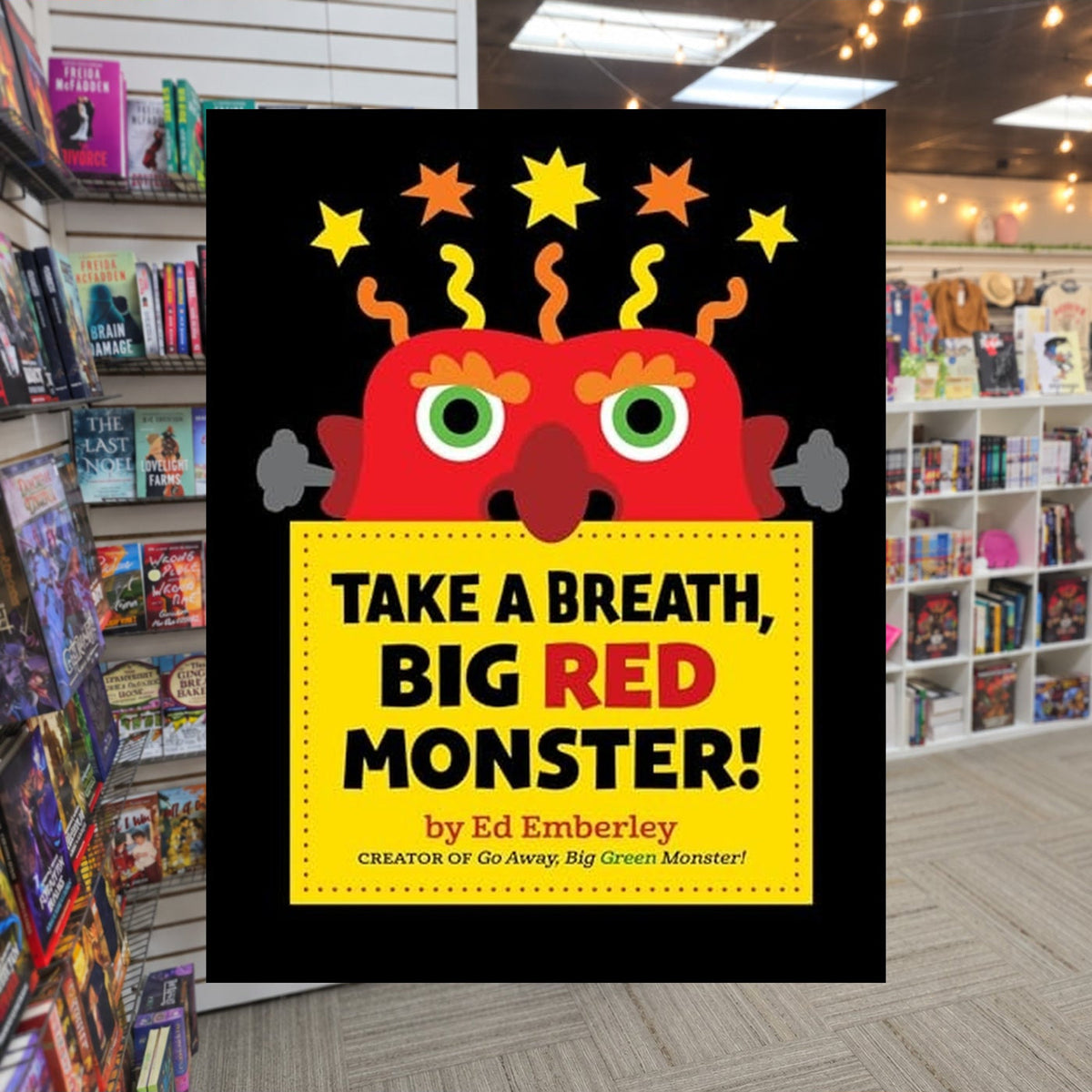 Take a Breath, Big Red Monster! by Ed Emberley — actual cover on The Perk bookstore background