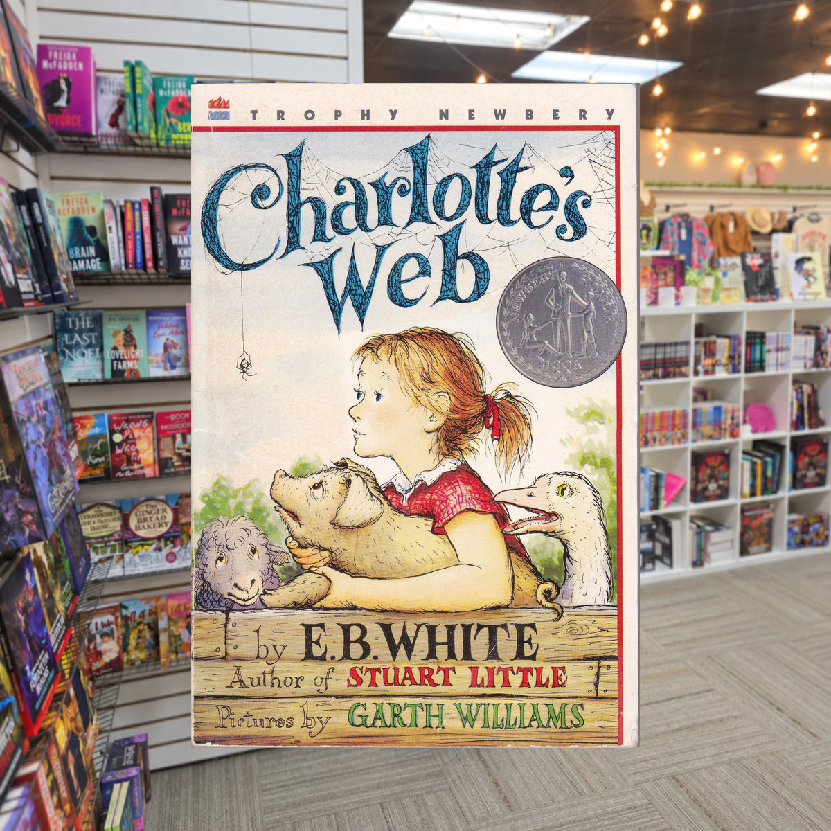 Charlotte's Web by E.B. White — actual cover on The Perk bookstore background