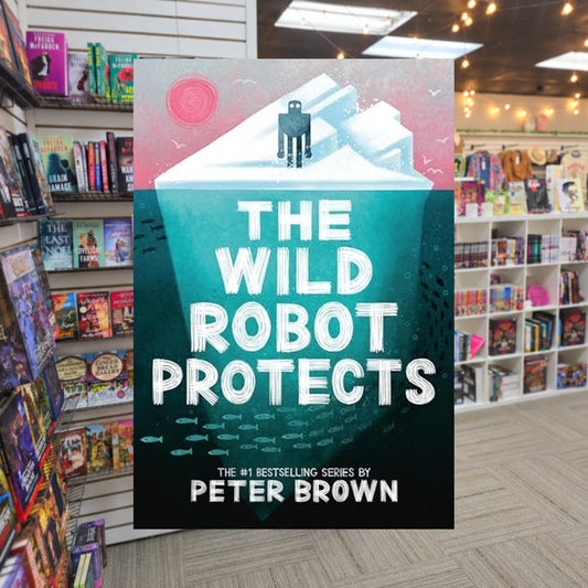 The Wild Robot Protects by Peter Brown — actual cover on The Perk bookstore background