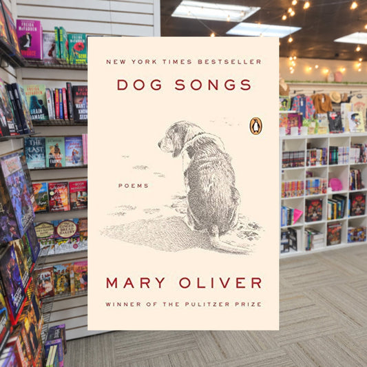 Dog Songs by Mary Oliver — actual cover on The Perk bookstore background