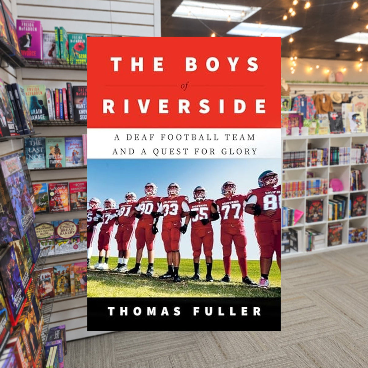 The Boys of Riverside: A Deaf Football Team and a Quest for Glory — actual cover on The Perk bookstore background
