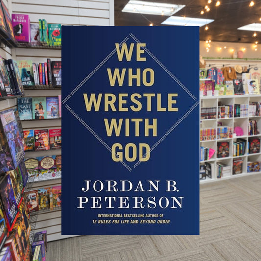 We Who Wrestle with God: Perceptions of the Divine by Jordan B. Peterson — actual cover on The Perk bookstore background