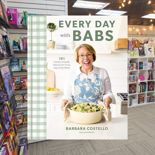 Every Day with Babs: 101 Family-Friendly Dinners for Every Day of the Week: A Cookbook by Barbara Costello — actual cover on The Perk bookstore background