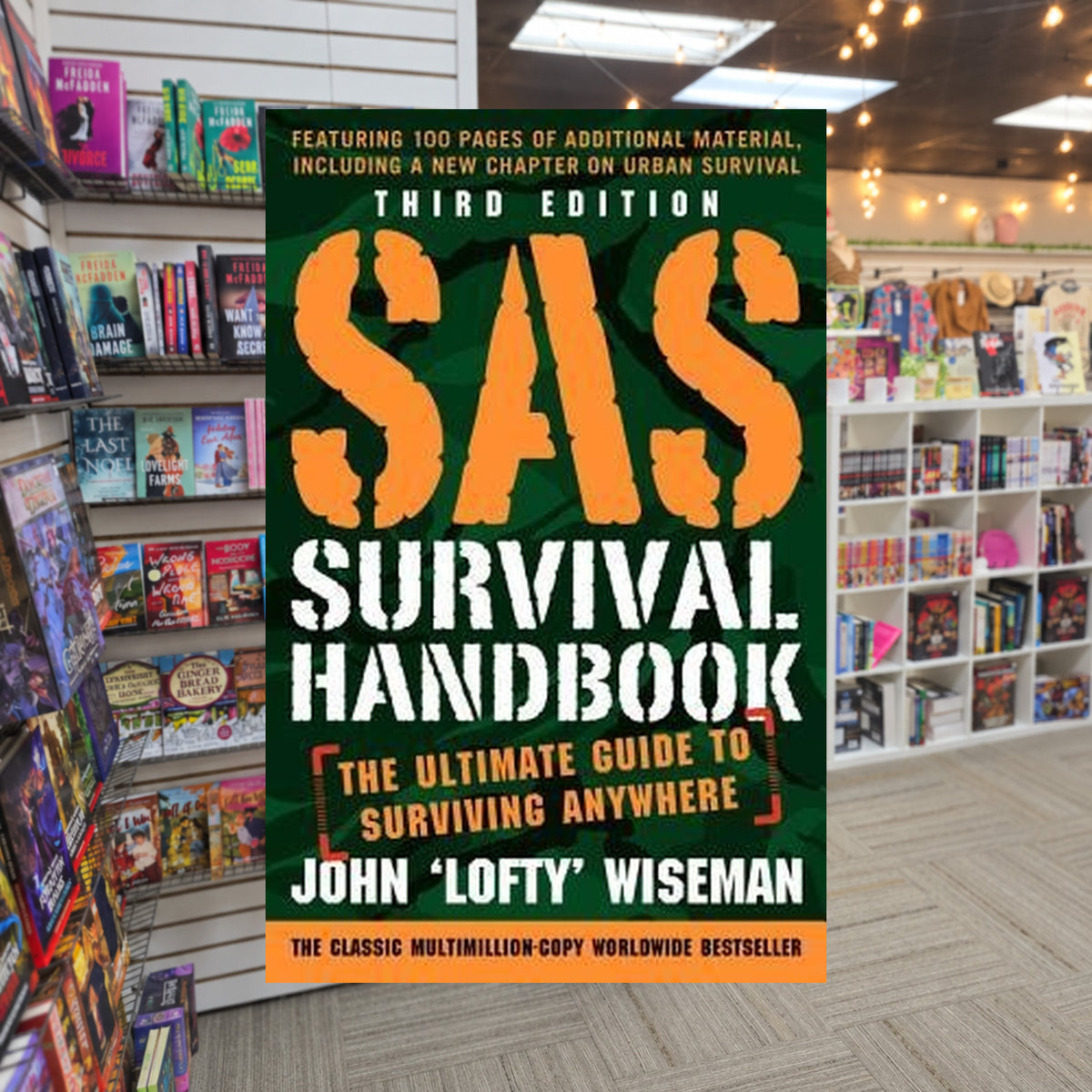 SAS Survival Handbook: The Ultimate Guide to Surviving Anywhere by John Wiseman — actual cover on The Perk bookstore background