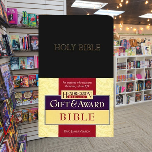 KJV Holy Bible — actual cover on The Perk bookstore background