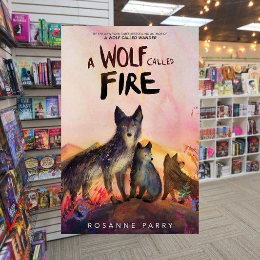 A Wolf Called Fire by Rosanne Parry — actual cover on The Perk bookstore background