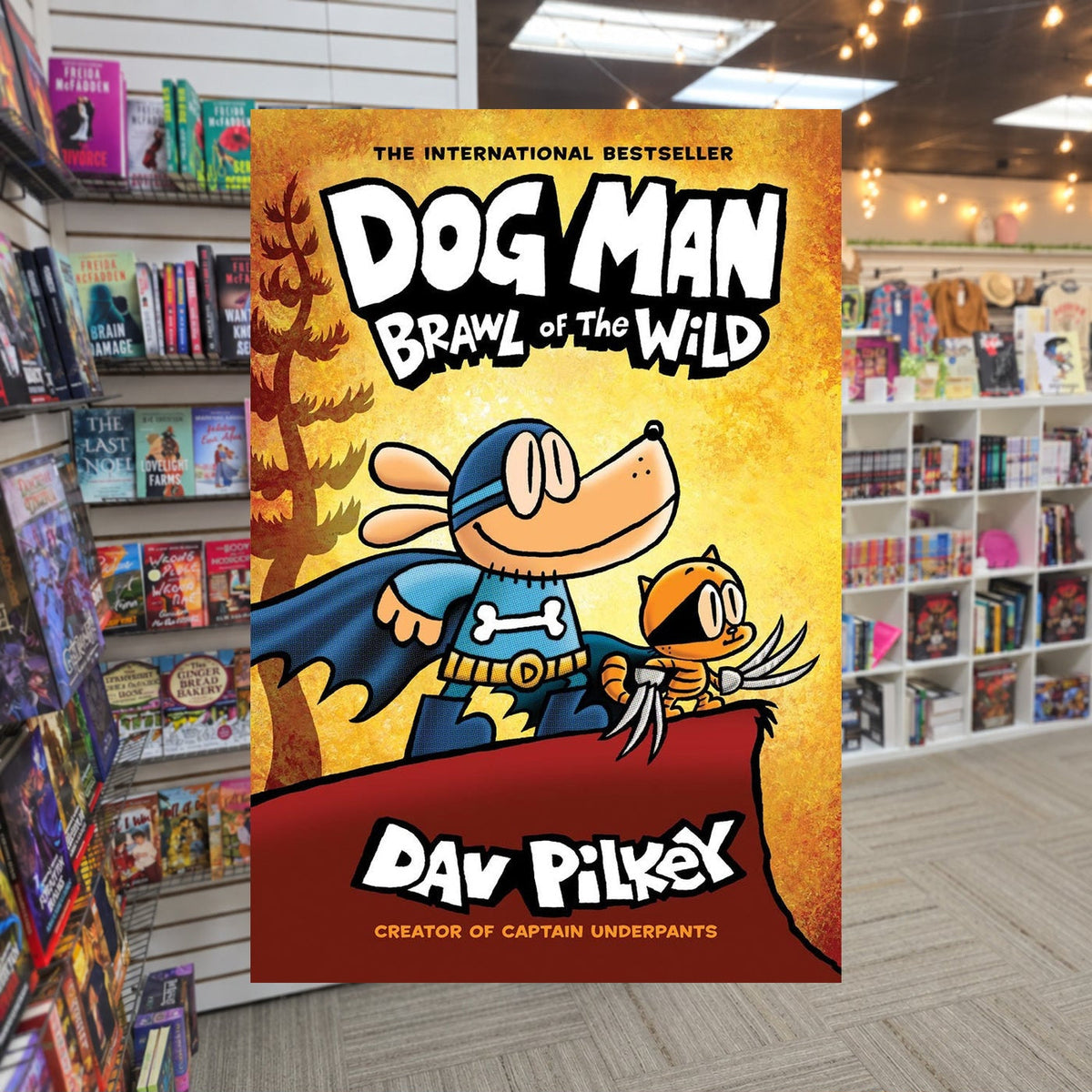 Dog Man: Brawl of the Wild Dav Pilkey — actual cover on The Perk bookstore background