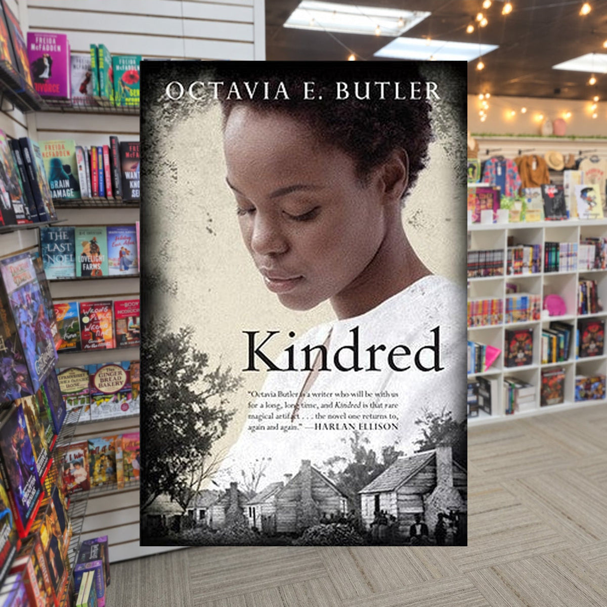 Kindred by Octavia E. Butler — actual cover on The Perk bookstore background