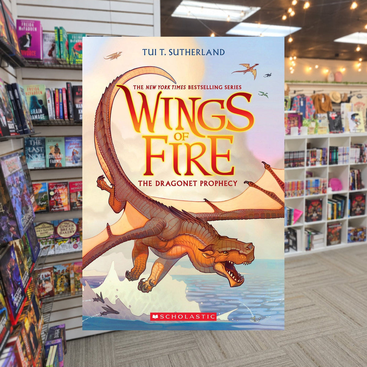 The Dragonet Prophecy by Tui T. Sutherland — actual cover on The Perk bookstore background