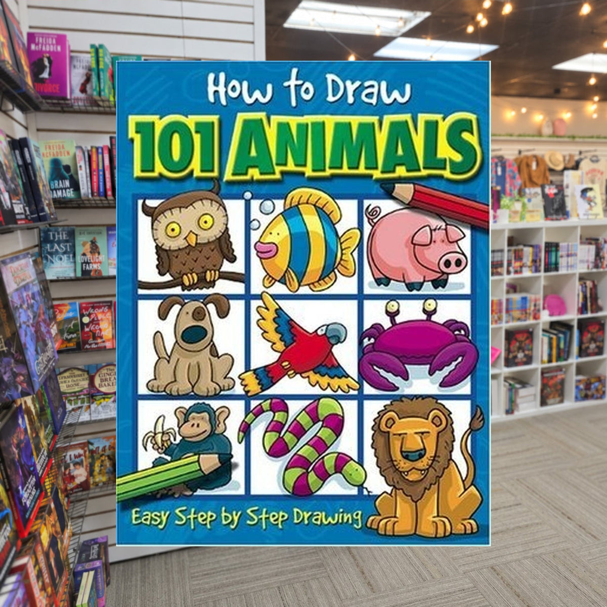 How to Draw 101 Animals by Dan Green — actual cover on The Perk bookstore background