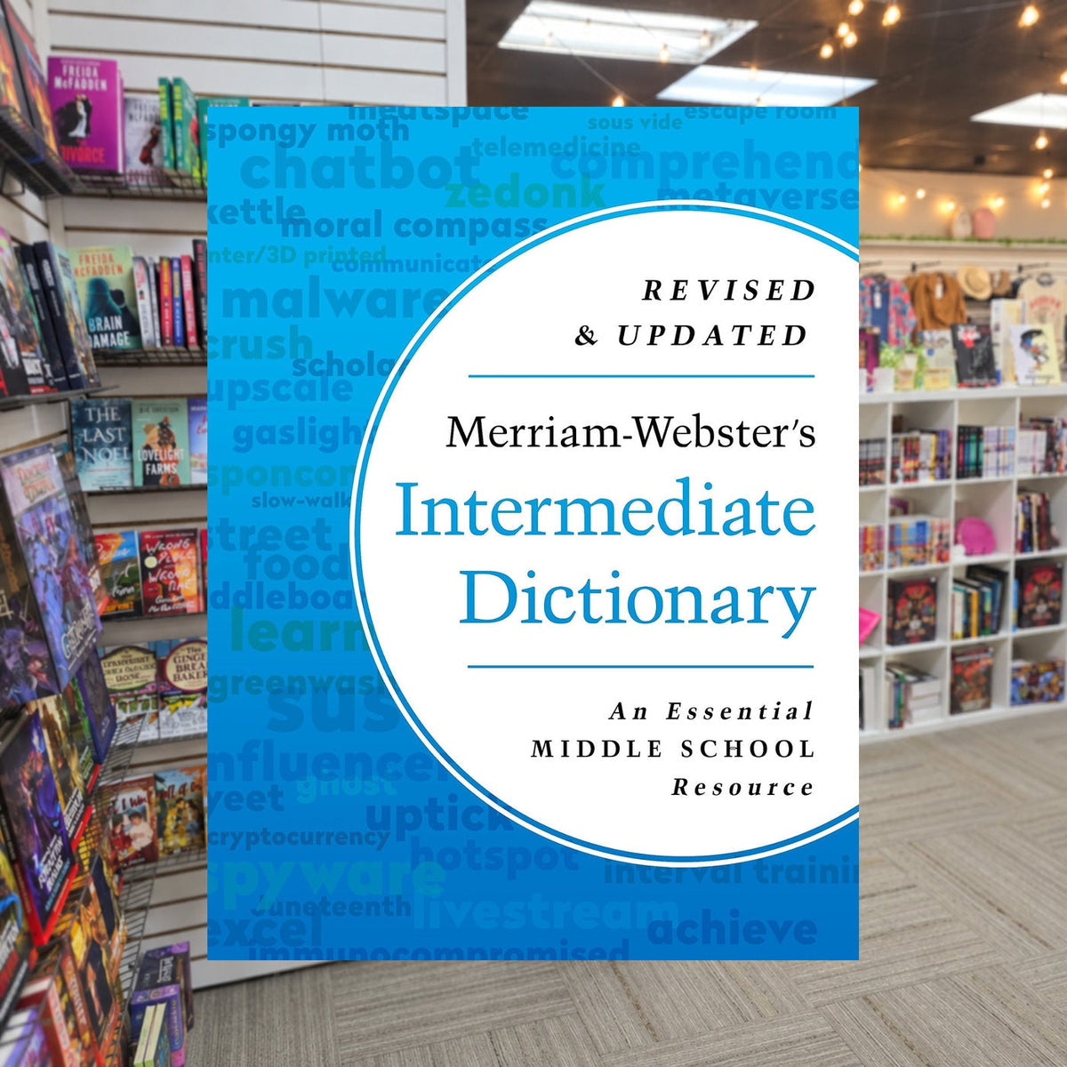 Merriam-Webster's Intermediate Dictionary - Middle School Dictionary - Features 70,000+ entries, usage examples, illustrations & more by Merriam-Webster — actual cover on The Perk bookstore background
