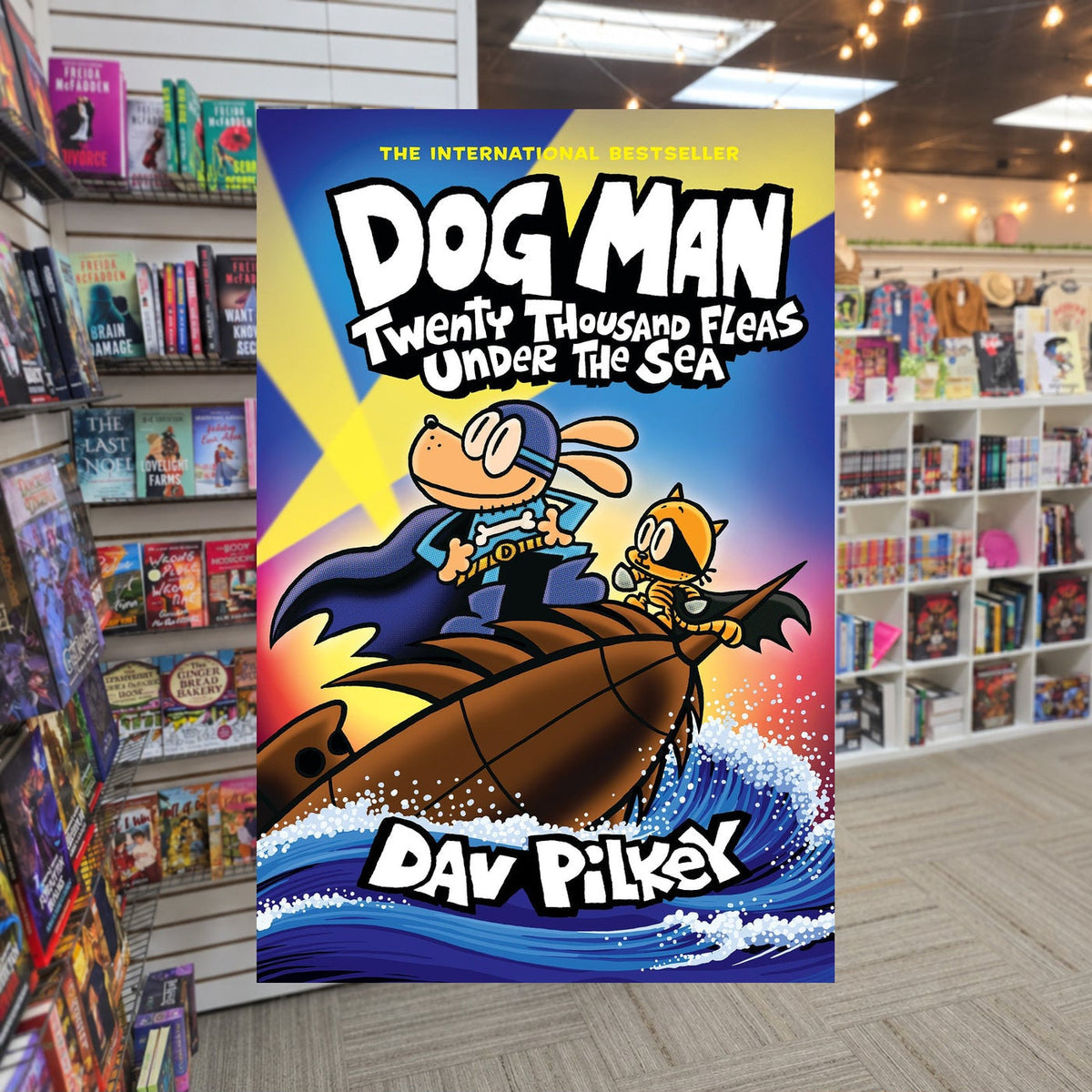 Twenty Thousand Fleas Under the Sea by Dav Pilkey — actual cover on The Perk bookstore background