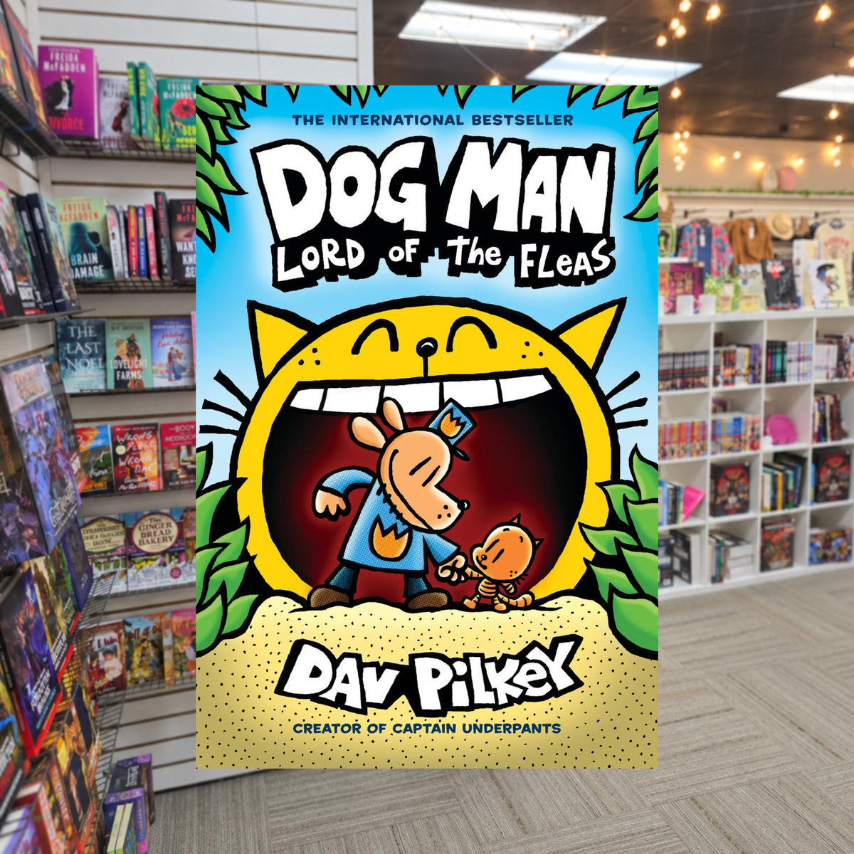 Dog Man: Lord of the Fleas by Dav Pilkey — actual cover on The Perk bookstore background