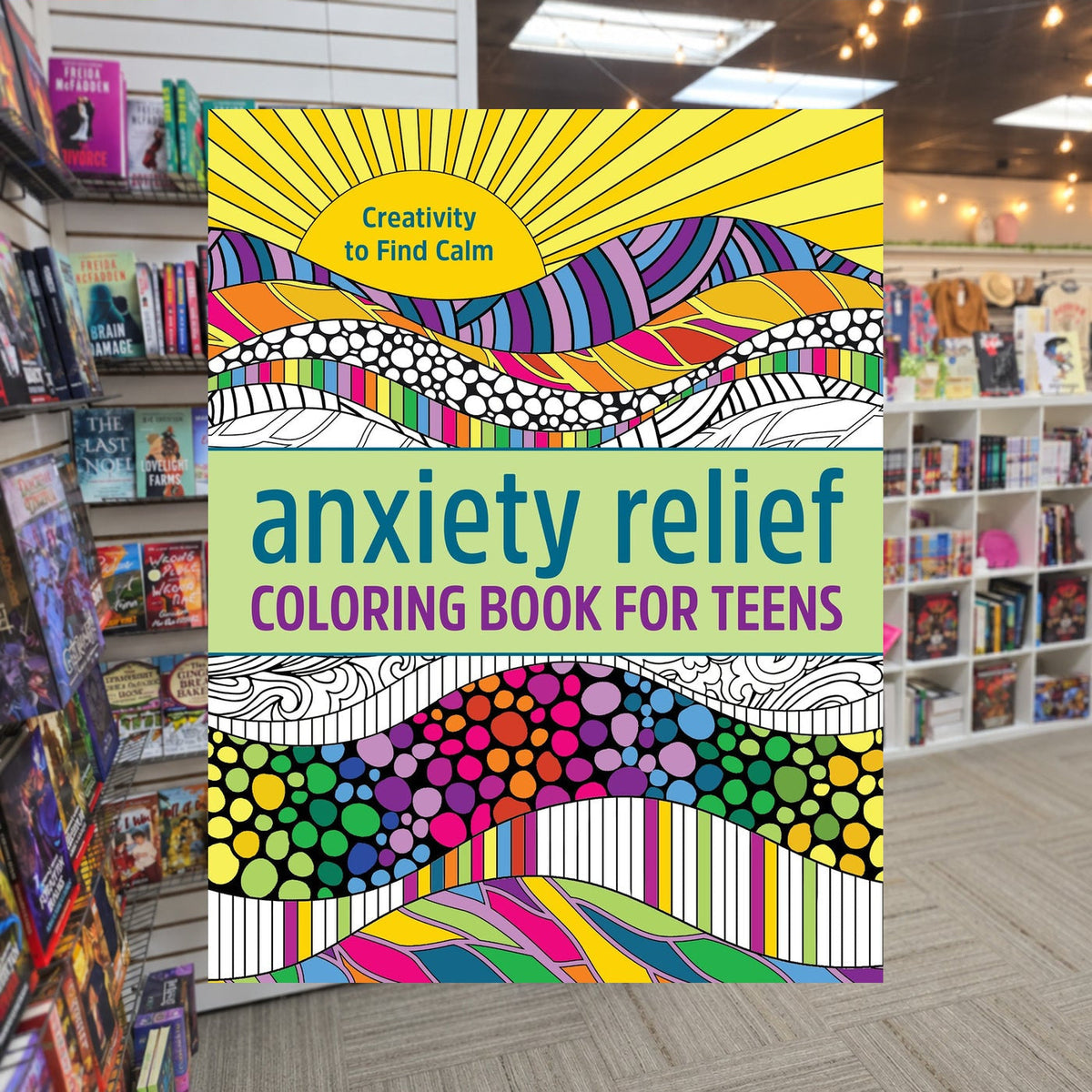 Anxiety Relief Coloring Book for Teens: Creativity to Find Calm — actual cover on The Perk bookstore background