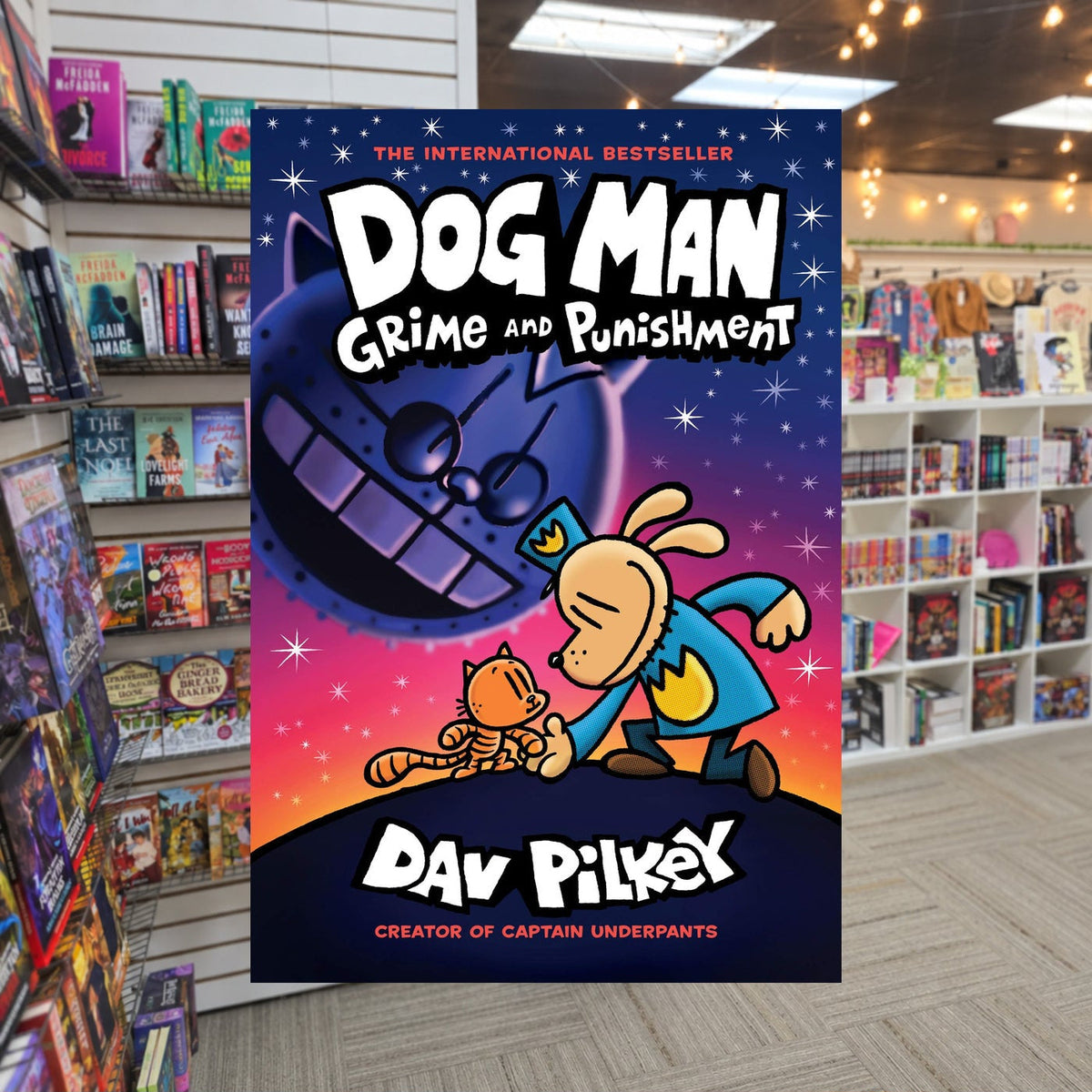 Dog Man: Grime and Punishment by Dav Pilkey — actual cover on The Perk bookstore background