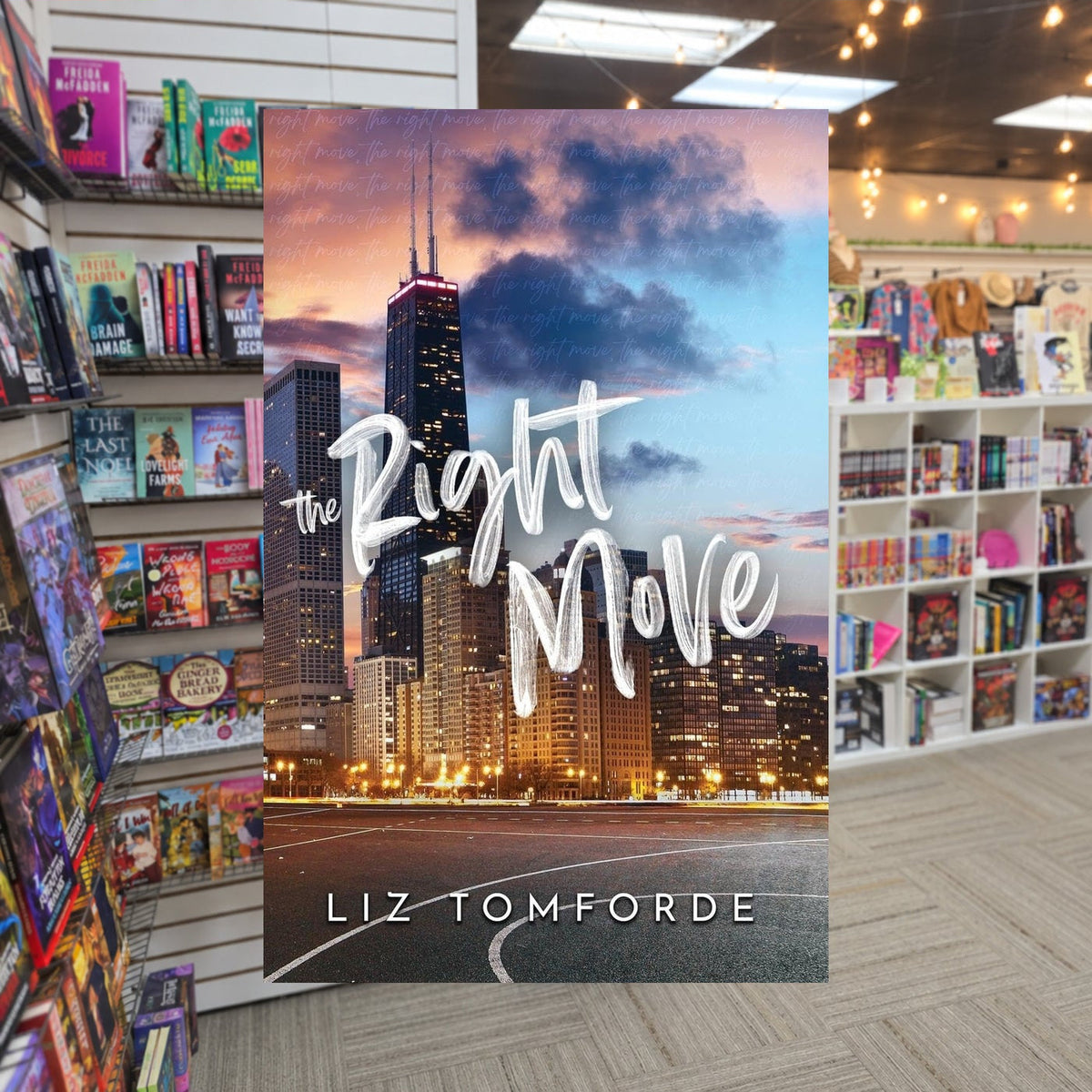 The Right Move by Liz Tomforde — actual cover on The Perk bookstore background