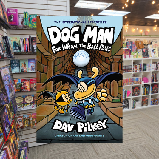 Dog Man: For Whom the Ball Rolls by Dav Pilkey — actual cover on The Perk bookstore background