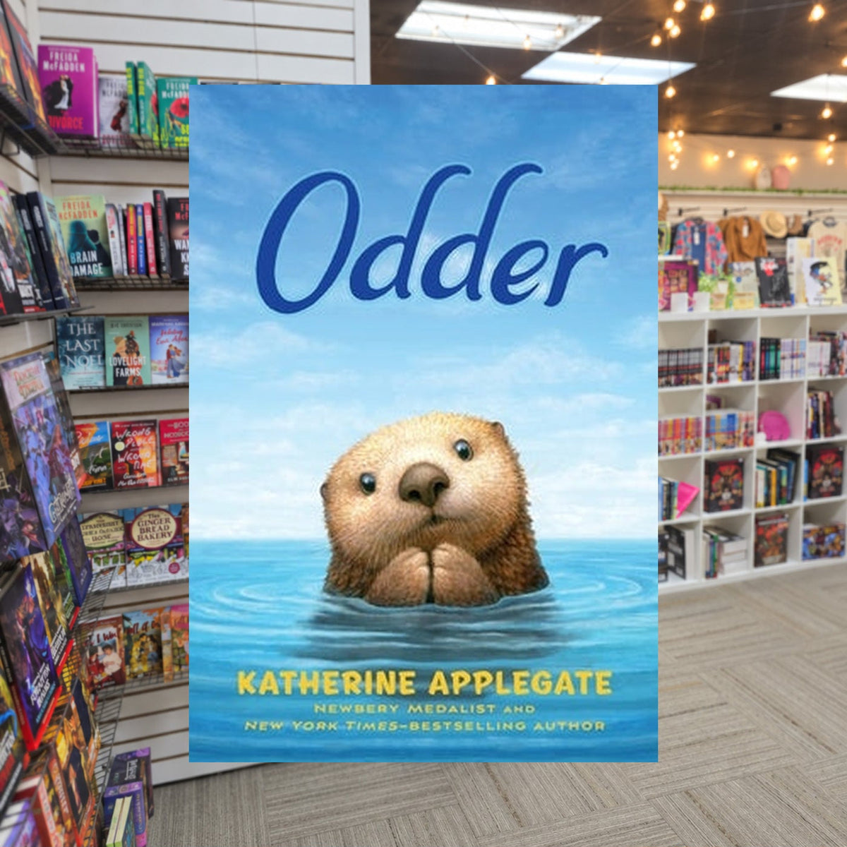 Odder by Katherine Applegate — actual cover on The Perk bookstore background
