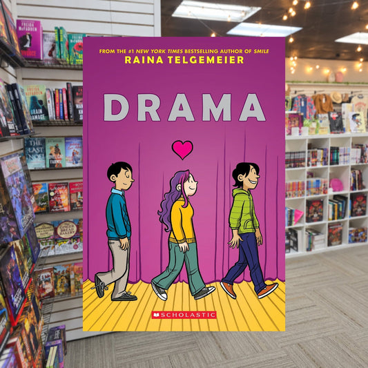 Drama by Raina Telgemeier — actual cover on The Perk bookstore background