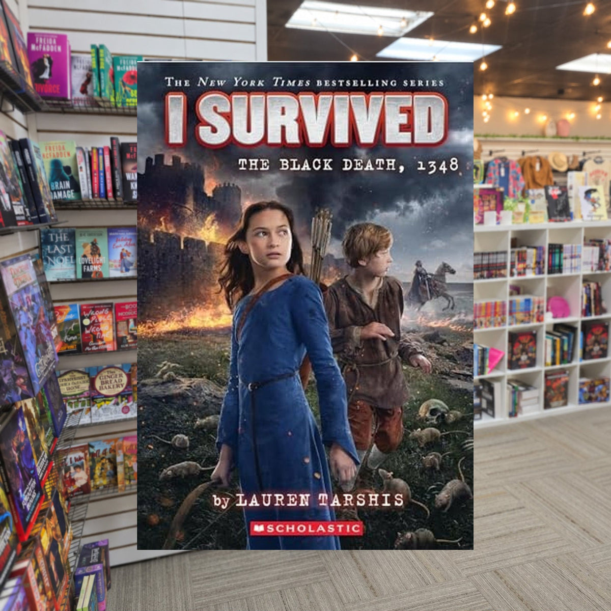 I Survived the Black Death, 1348 by Lauren Tarshis — actual cover on The Perk bookstore background