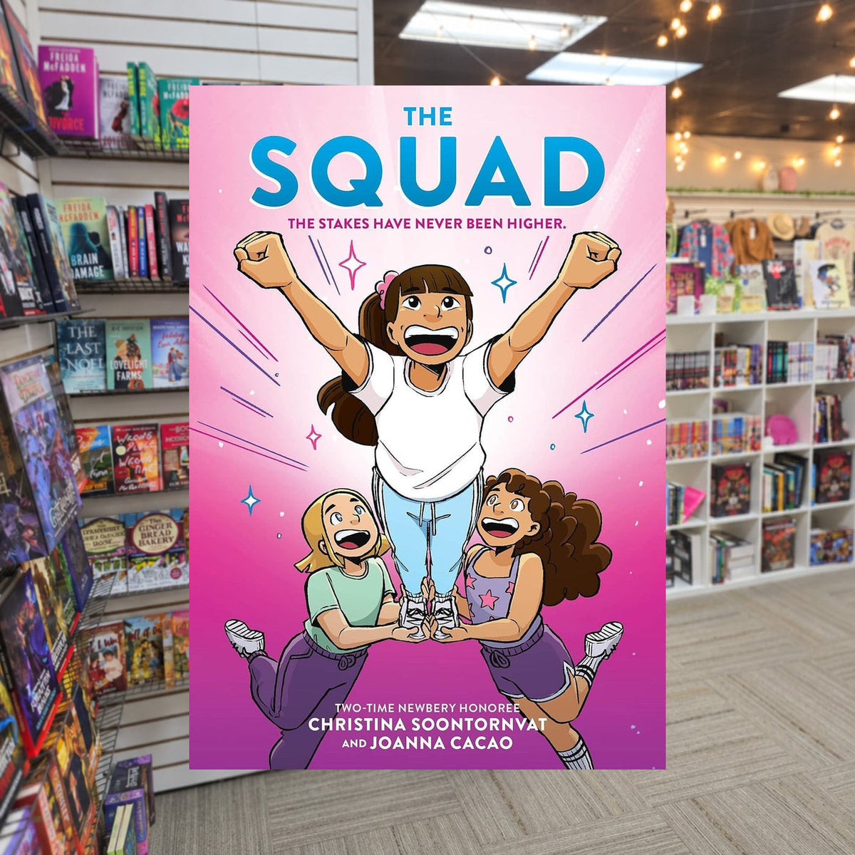 The Squad by Christina Soontornvat — actual cover on The Perk bookstore background