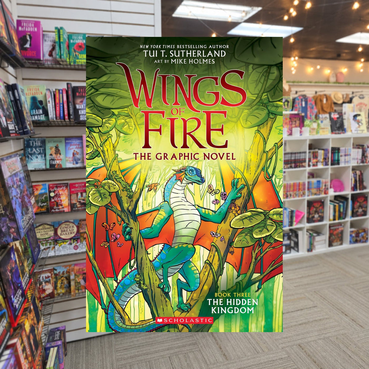 The Hidden Kingdom by Tui T. Sutherland — actual cover on The Perk bookstore background