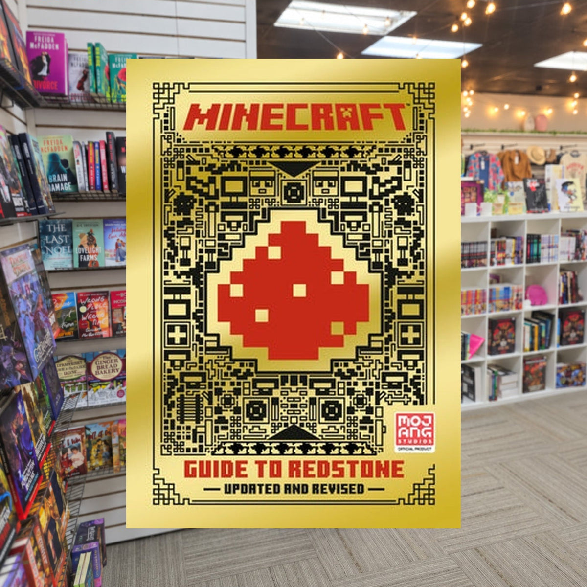 Minecraft: Guide to Redstone by Mojang AB — actual cover on The Perk bookstore background