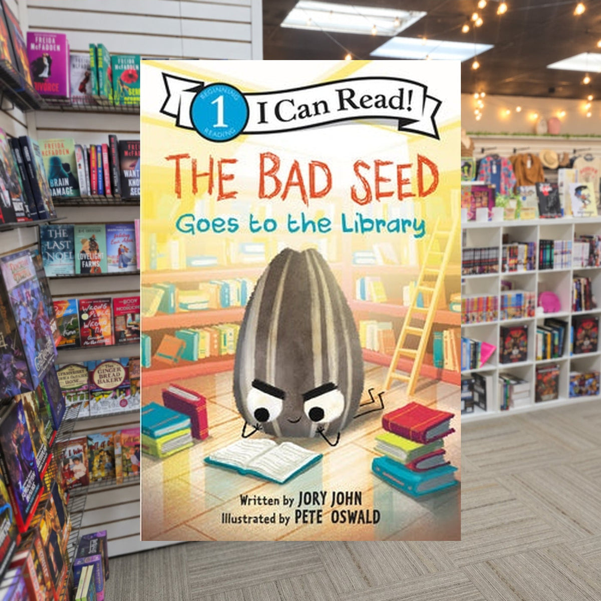 The Bad Seed Goes to the Library by Jory John — actual cover on The Perk bookstore background