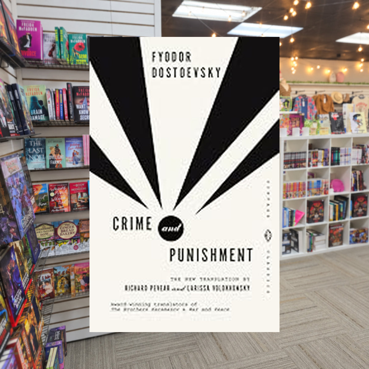 Crime and Punishment by Fyodor Dostoevsky, Richard Pevear (Translator), Larissa Volokhonsky (Translator) — actual cover on The Perk bookstore background