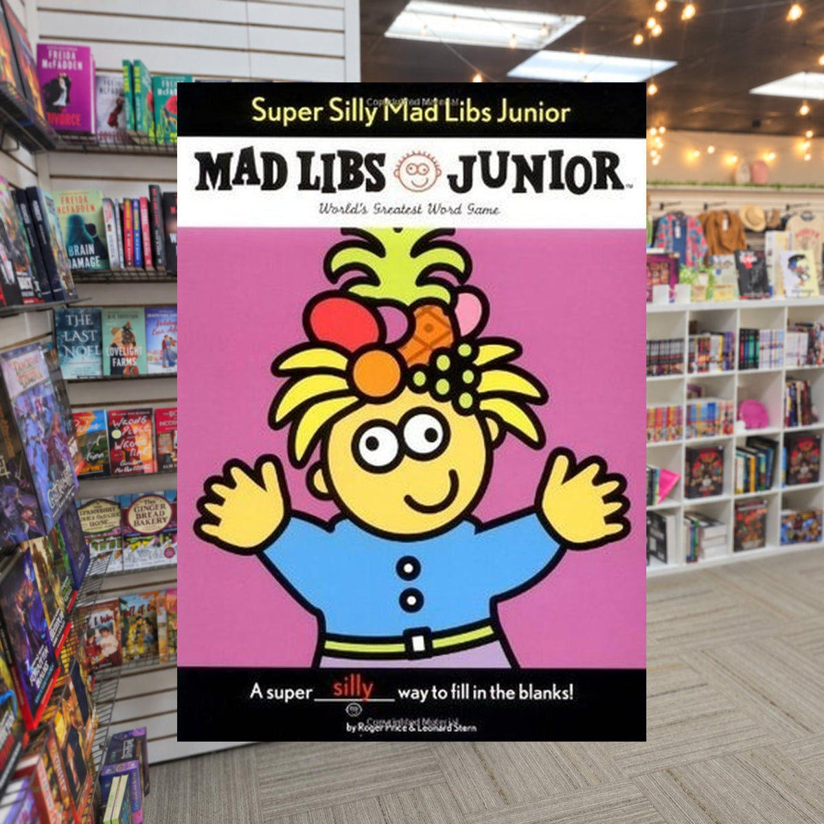 Super Silly Mad Libs Junior: World's Greatest Word Game by Roger Price — actual cover on The Perk bookstore background